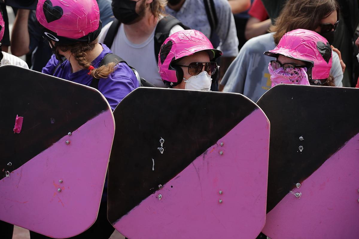Antifa Protestors Crash Funeral of Heather Hayer, Show Up With Bats and Shield