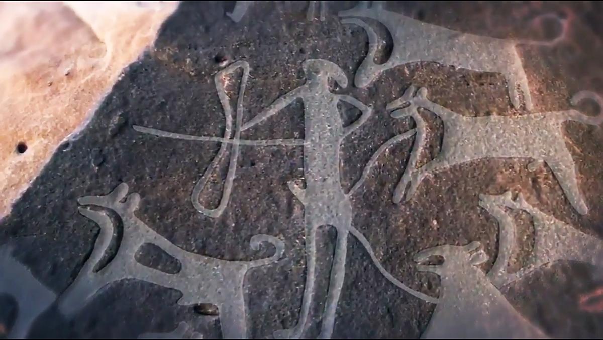 8,000-Year-Old Engraving Shows Dogs Were Helping Humans Hunt