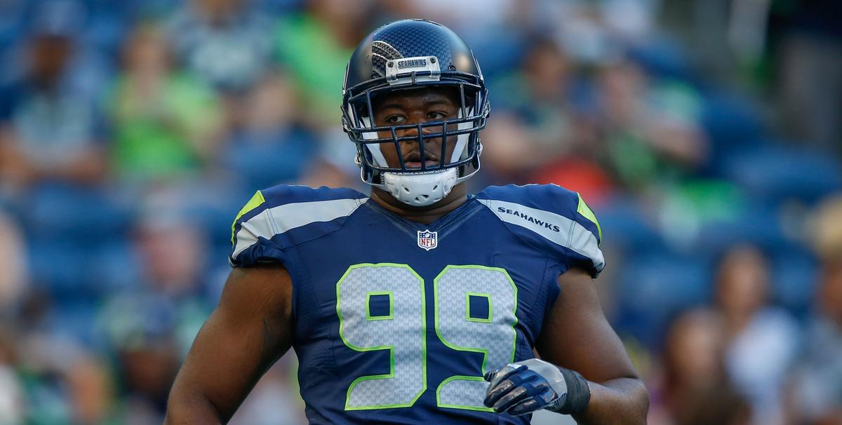 Seahawks Player Attempts to Climb Stands After Fan Throws Drink