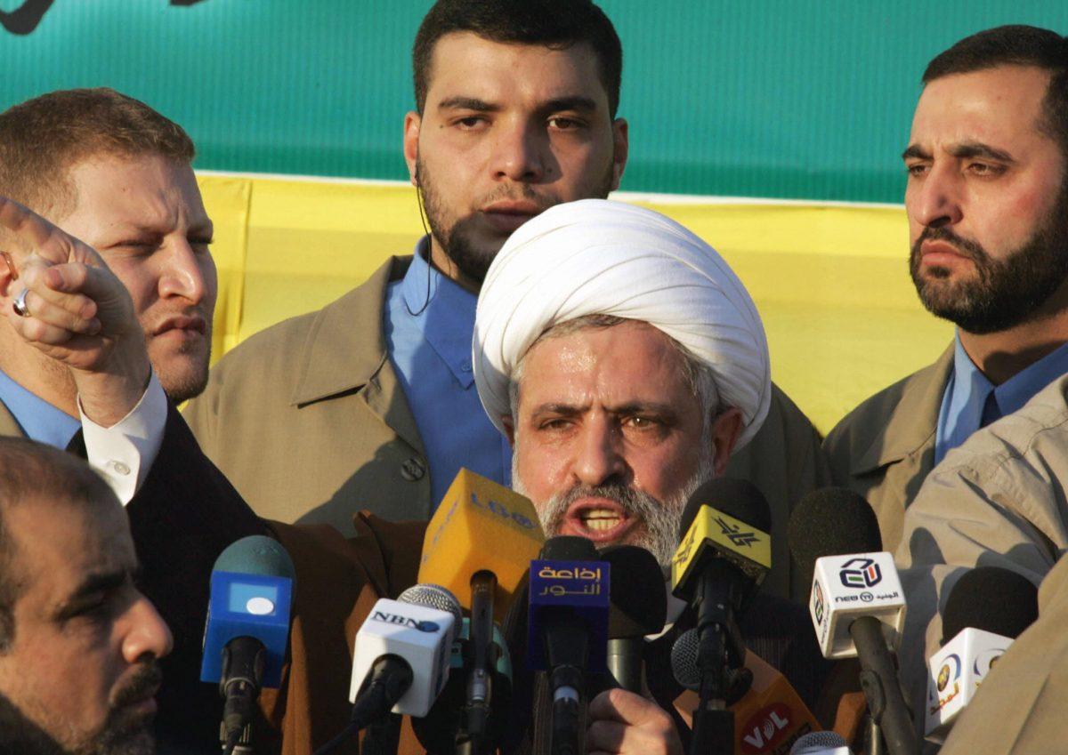 Hezbollah then-Deputy Secretary-General Naim Qassem speaks to thousands of Lebanese people demonstrating in Beirut, Lebanon, in November 2004. (Ramzi Haidar/AFP/Getty Images)