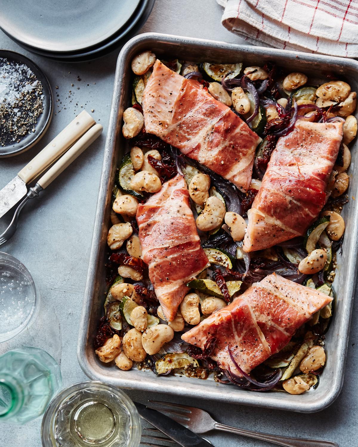 Prosciutto-Roasted Ruby Trout With Zucchini and Butter Beans