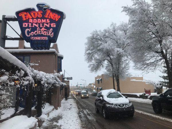 Traffic moved through the town center after a major winter storm dropped around 8 inches of snow in Taos, New Mexico, on Jan. 11, 2019. (Reuters/Andrew Hay)