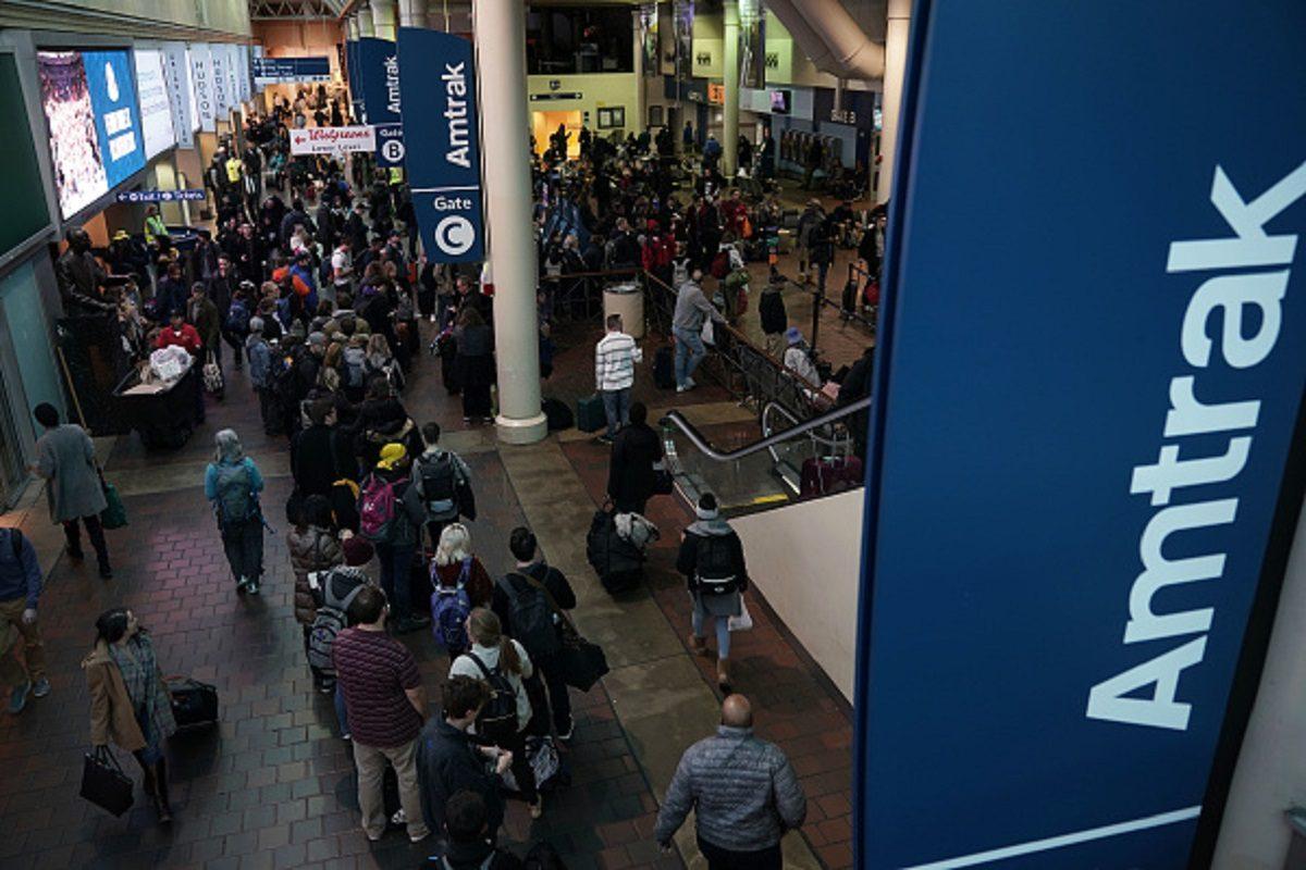 Passengers wait to board an Amtrak train at Union Station on the day before the Thanksgiving holiday, in Washington, on Nov. 21, 2018. (Photo by Alex Wong/Getty Images)