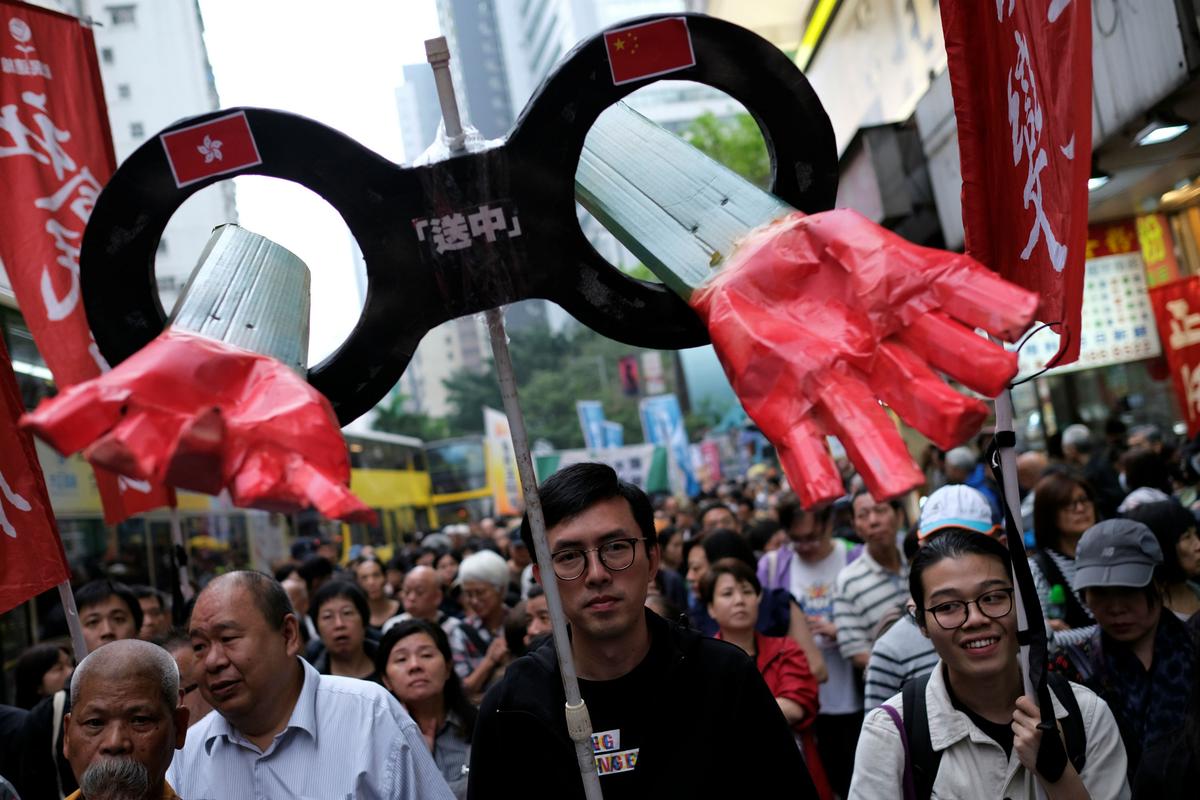 Thousands Protest Hong Kong’s Plans to Open Extradition to China