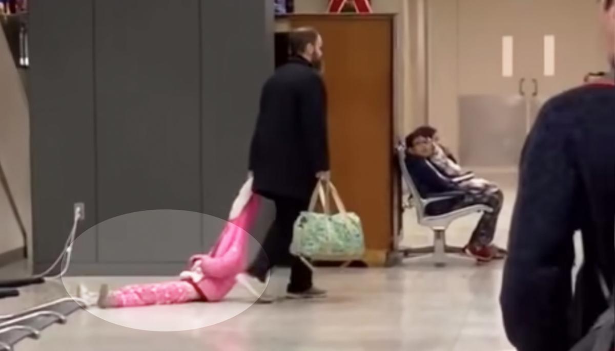 Dad Caught on Video Dragging Girl Through Airport by Hood: ‘I Totally Get It As a Parent’