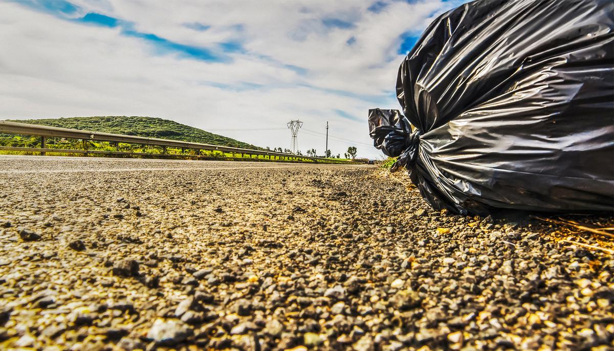 Kentucky Woman Notices a Trash Bag on the Side of Road. Then Realizes, It’s Moving