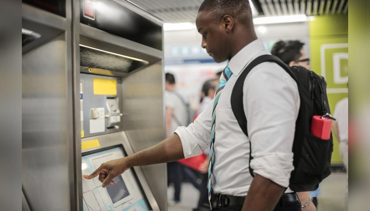 Elderly Man Shows Young Man How to Tie a Tie After Seeing Him Struggling at Train Station