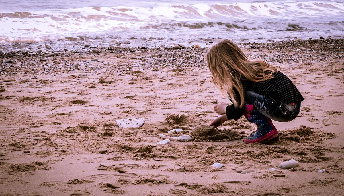 Girl on Spring Break Stumbles Upon Million-Year-Old Megalodon Shark Tooth