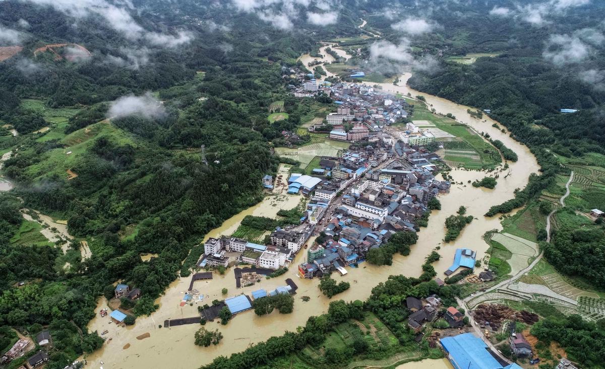 A view of submerged buildings and roads after heavy rain caused flooding in Rongan in China's southern Guangxi region, on June 9, 2019. (STR/AFP/file/Getty Images)