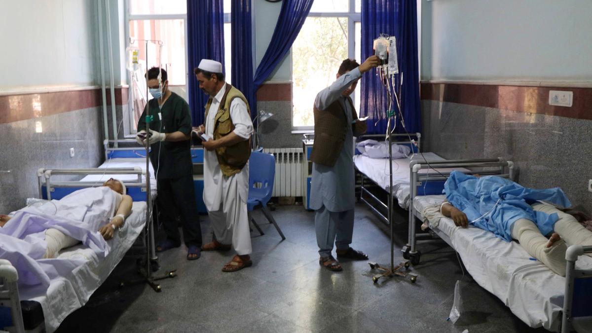 Roadside Bomb Hits Bus in Afghanistan, Killing at Least 35 and Wounding 27