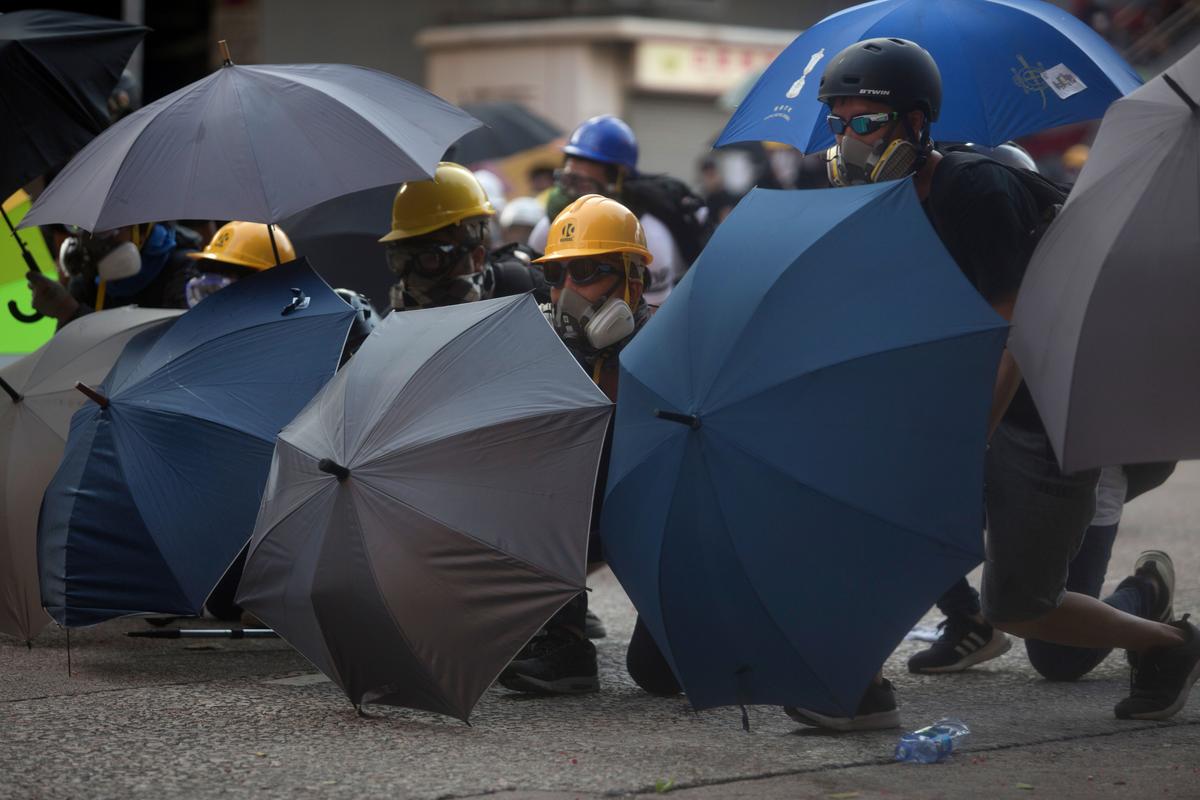 Hongkongers Hold Strike Despite Similarly Worded Stern Warnings by Hong Kong, Beijing Authorities