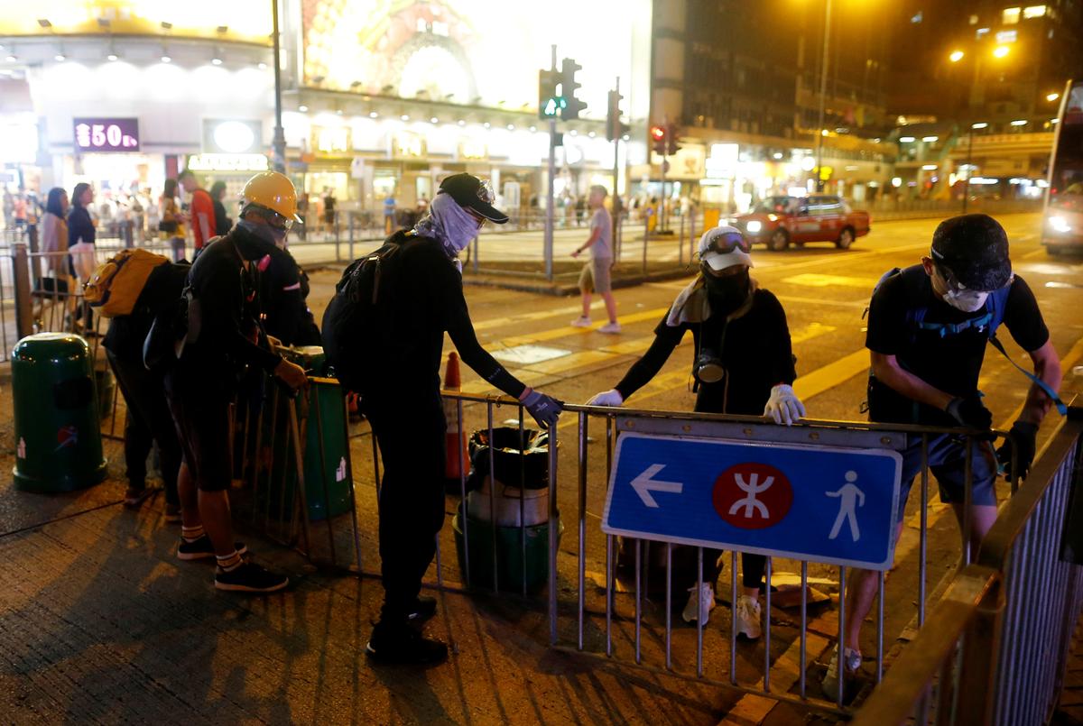 Thousands Rally in Hong Kong in Fresh Protests, Marchers Defy Police Ban