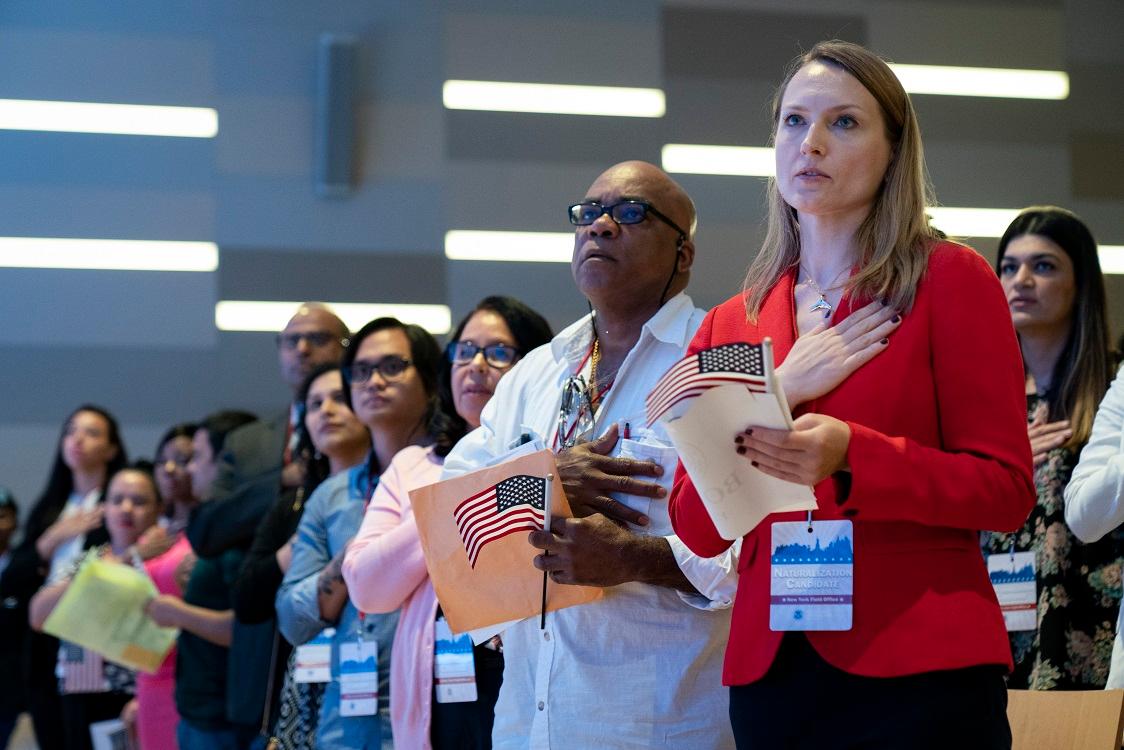 Heckled When She Spoke Out for Pledge of Allegiance, Academic Sues