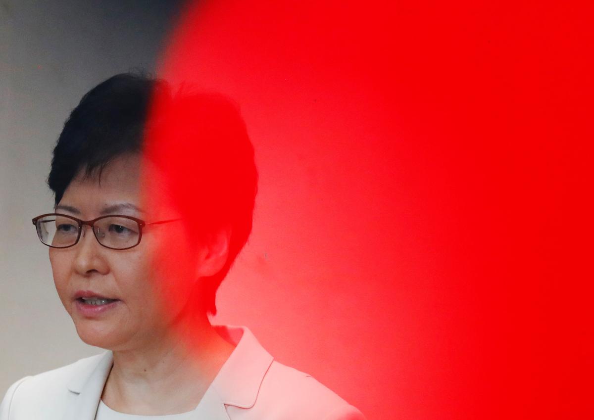 Hong Kong Leader Carrie Lam ‘Has to Serve Two Masters’