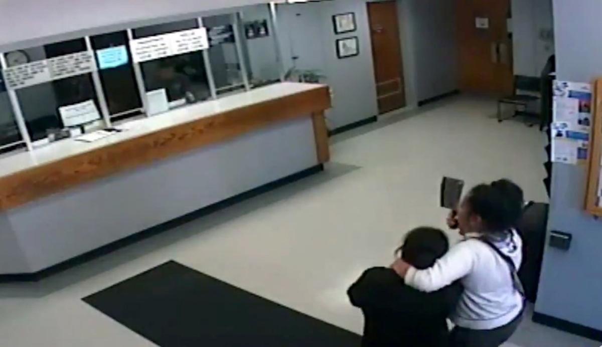 Video Shows Moment Cleaver-Wielding Woman Takes Hostage Inside Police Station