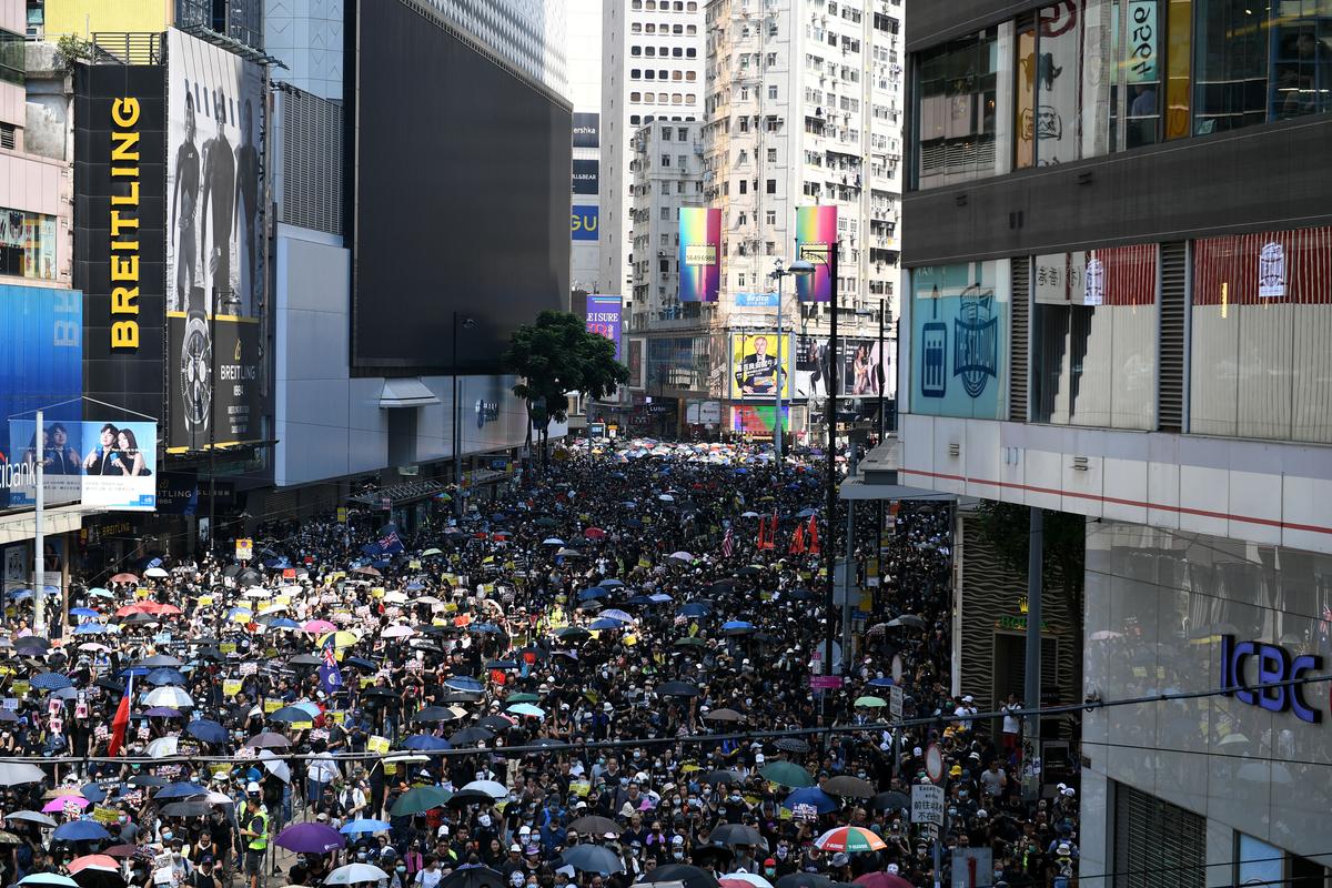 ‘We Are Mourning:’ Thousands of Hongkongers March on Communist Party Anniversary Despite Ban