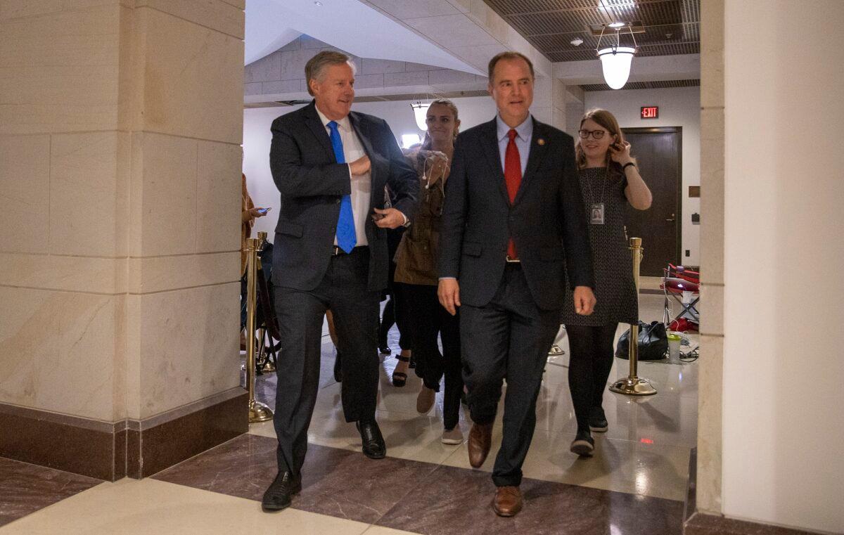 Reps. Mark Meadows (R-N.C.) (L) and Adam Schiff (D-Calif.) return to a closed session before the House Intelligence, Foreign Affairs, and Oversight committees at the U.S. Capitol in Washington on Oct. 15, 2019. (Tasos Katopodis/Getty Images)