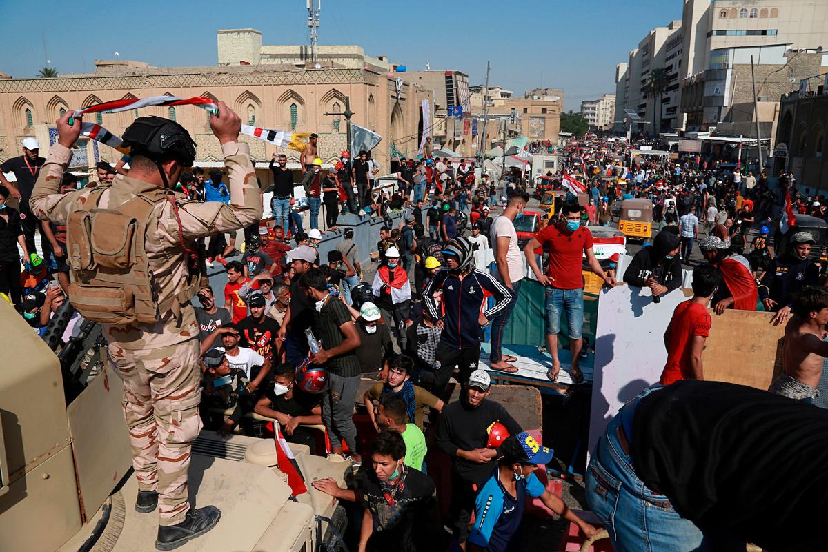 Iraq Protesters Storm Baghdad Bridge, Medic Killed