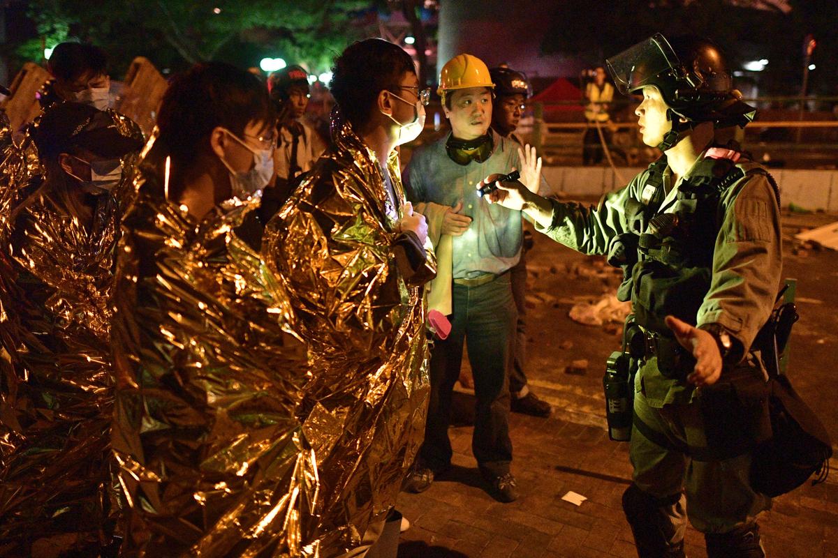 Dozens Remain Trapped on Hong Kong School Campus