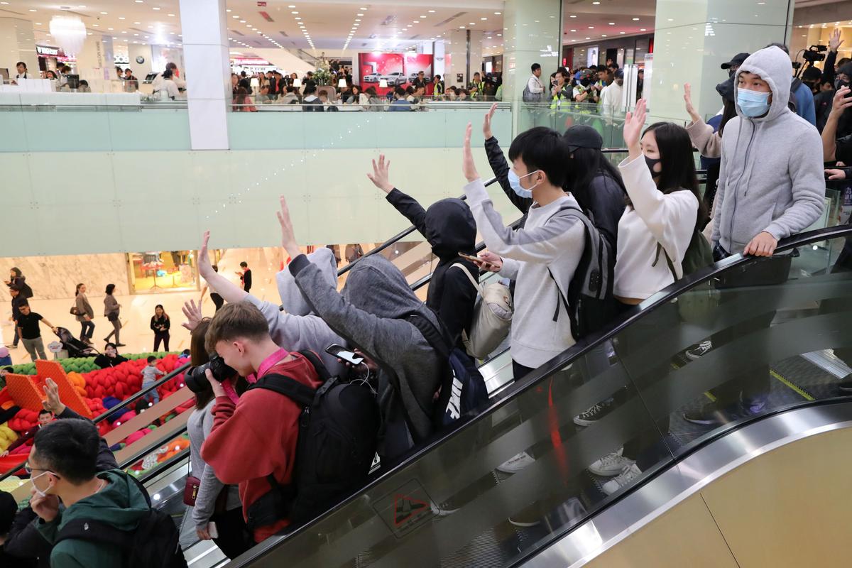 Hong Kong Protesters Gather at Malls to Remember Metro Station Attack