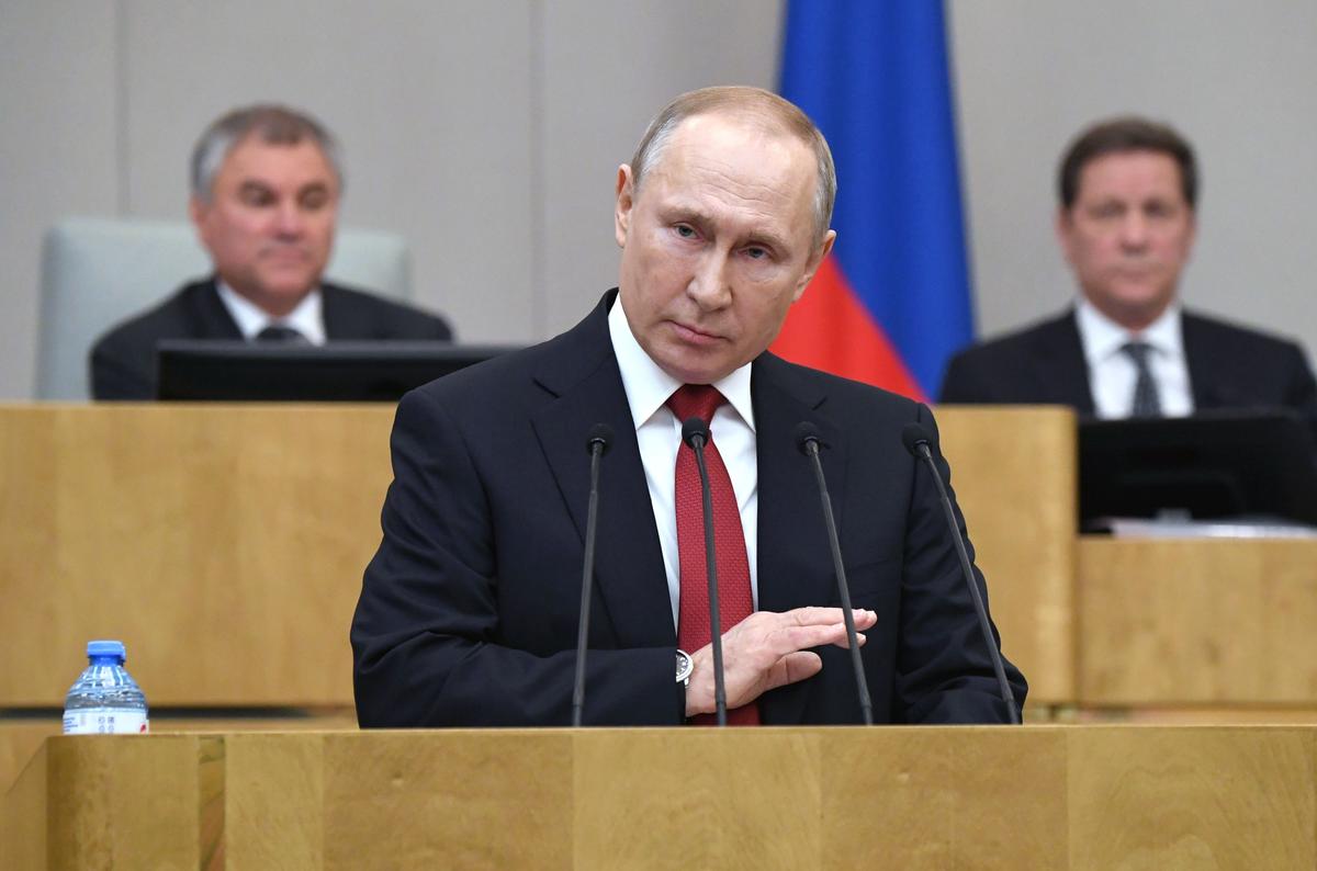 Putin Backs Term-Limit Freeze Allowing Him to Stay in Office