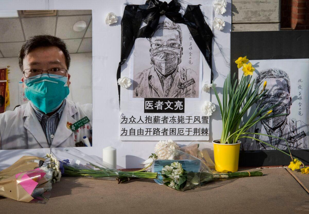 Chinese students and their supporters hold a memorial for Dr. Li Wenliang, the whistleblower of the CCP Virus that originated in China’s Wuhan city, outside the UCLA campus in Westwood, Calif., on Feb. 15, 2020. (Mark Ralston/AFP via Getty Images)