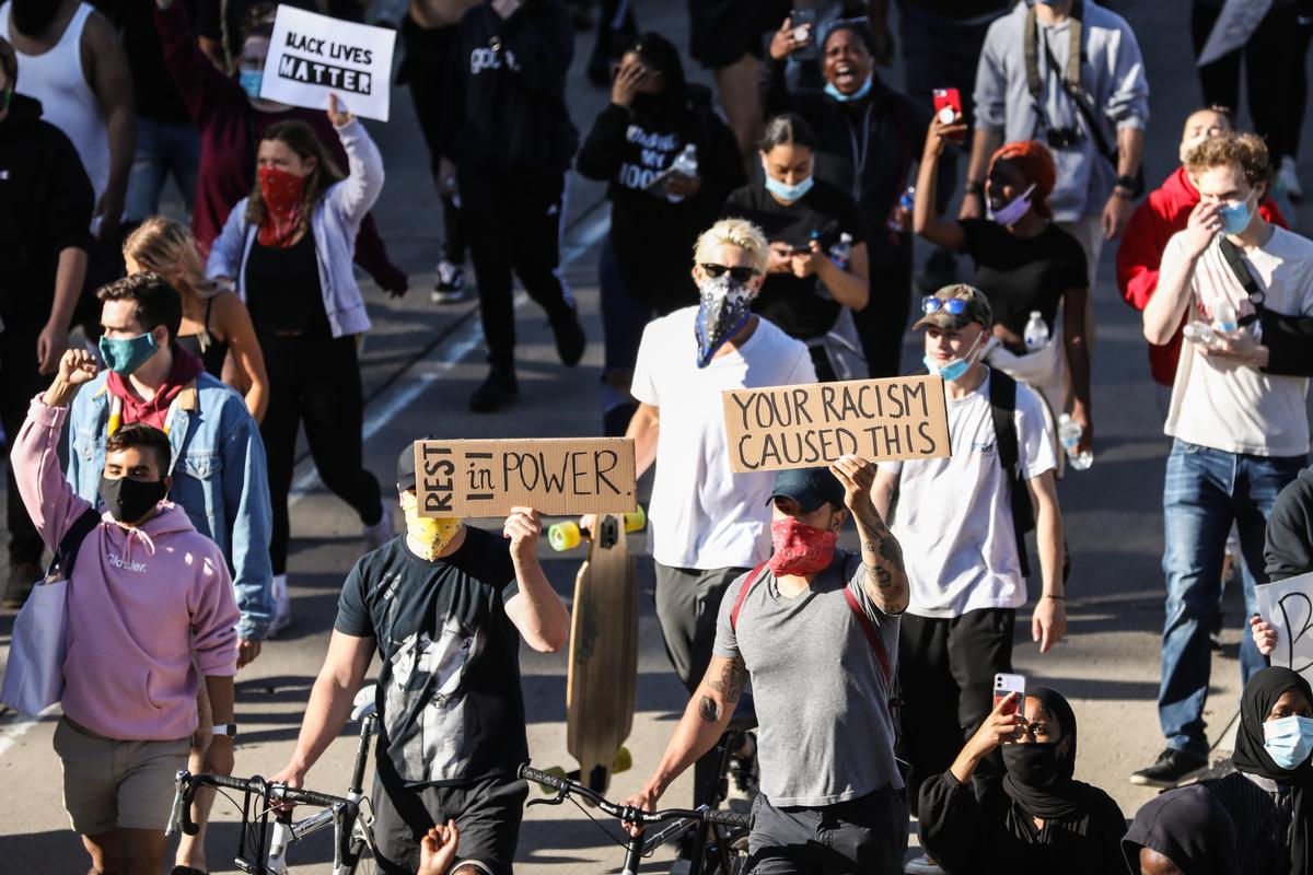 Hundreds of Protesters Detained After Blocking Traffic on Bridge in Dallas