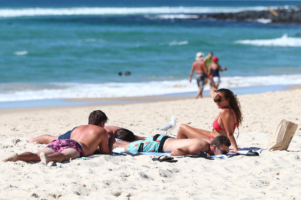 Queenslanders Frolic as Restrictions Ease