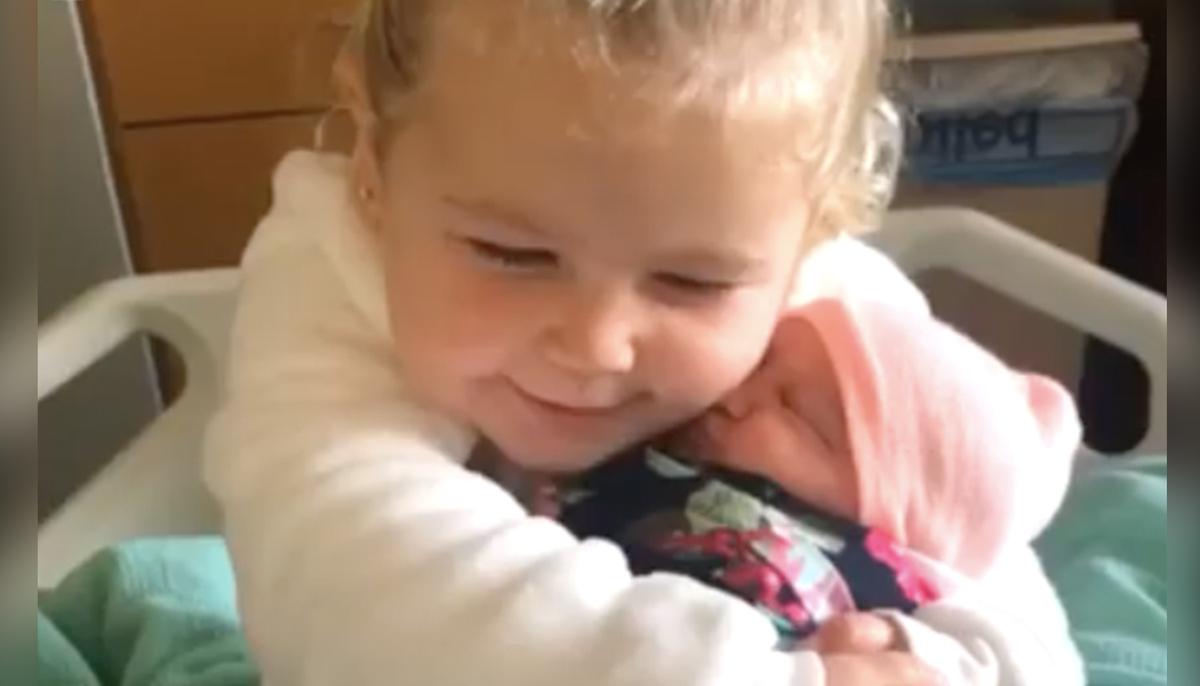 Video: Toddler Falls in Love With Baby Sister on Meeting Her for the First Time
