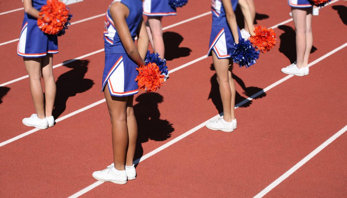 High School Cheerleader Sees Toddler Choking During Parade, Performs Heimlich, Saves His Life