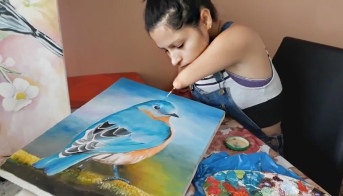 ‘I Have No Limit’: Artist Born Without Arms and Legs Defies All Odds, Now Inspires Others