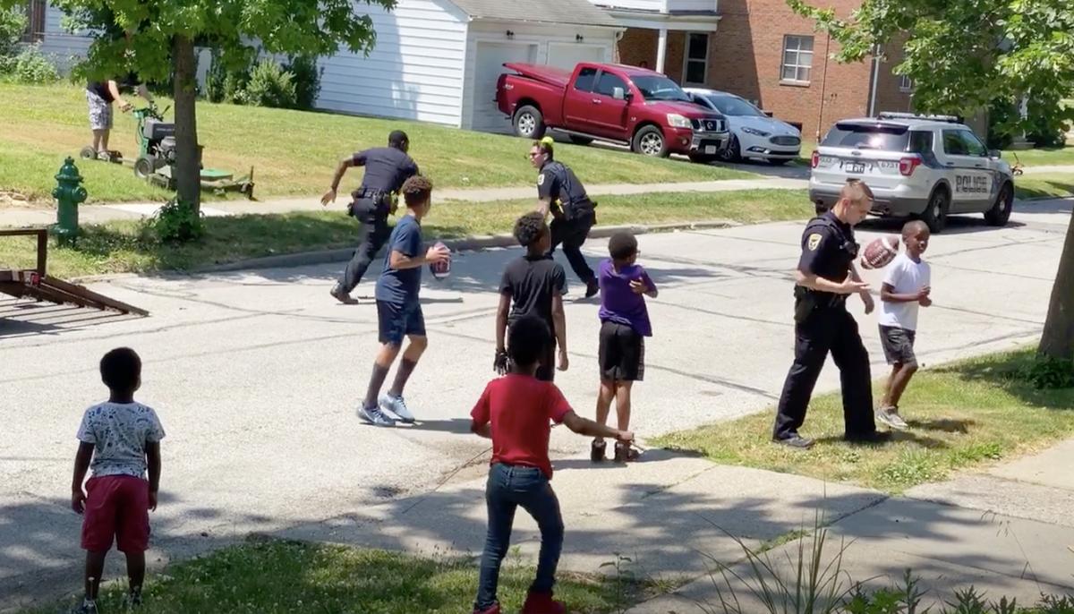 ‘Karen’ Reports Kids for Playing Football in the Street–Then Cops Respond by Joining the Game