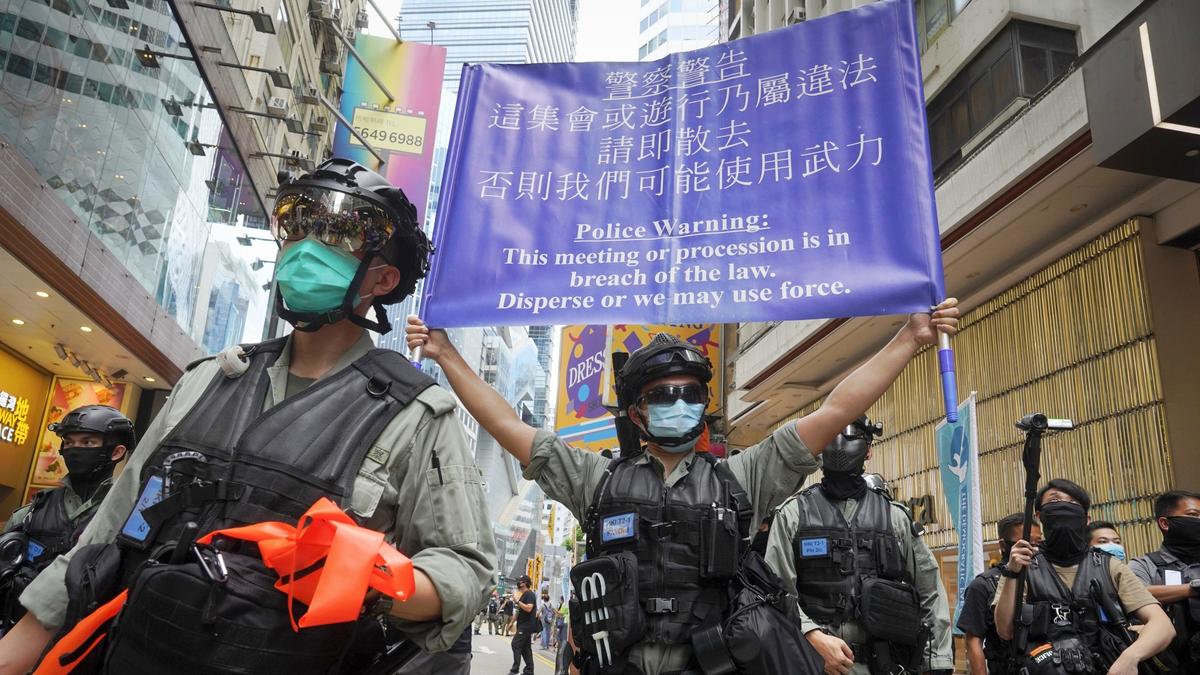 Hong Kong Police Make First 2 Arrests Under National Security Law