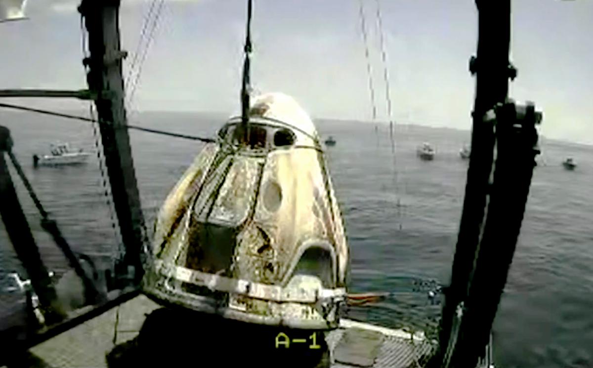 NASA Astronauts Splash Down After Journey Home Aboard SpaceX Capsule
