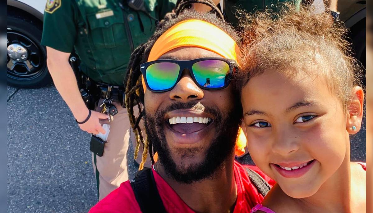 Black Dad Takes Daughter to Meet Cops, Teaches Her ‘Love & Compassion Leaves No Room for Hate’