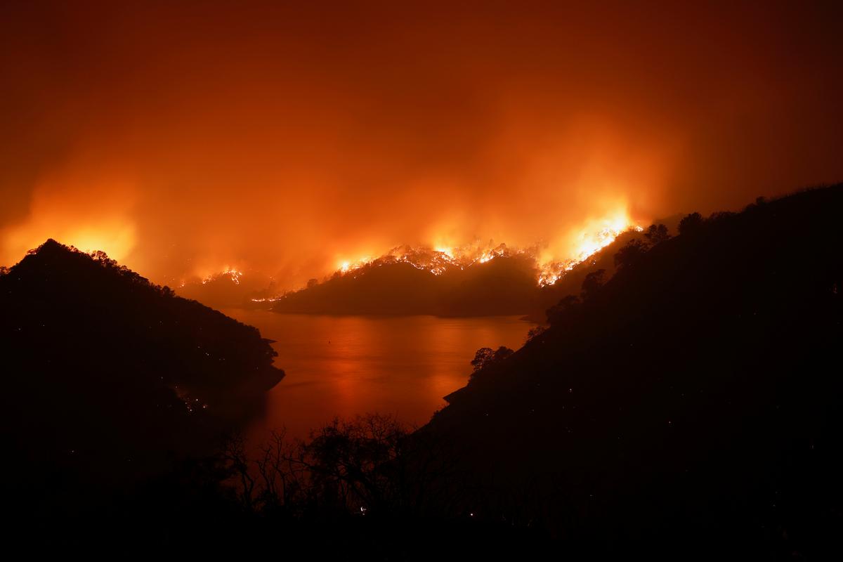 2 Die Fighting California Lightning Fires, Tens of Thousands Flee