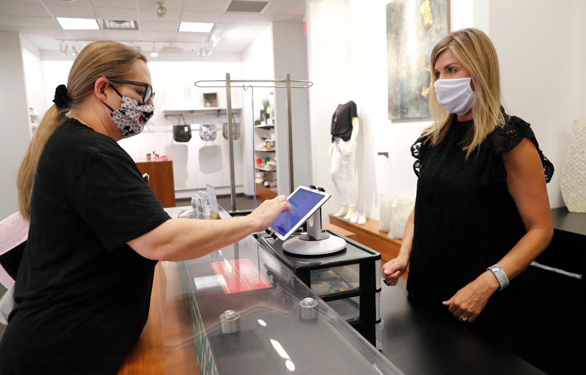 As Shoppers Stay Away, Small Stores Seek Refuge Online