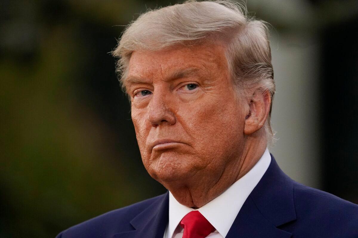 President Donald Trump listens during an event on Operation Warp Speed in the Rose Garden of the White House in Washington on Nov. 13, 2020. (Evan Vucci/AP Photo)