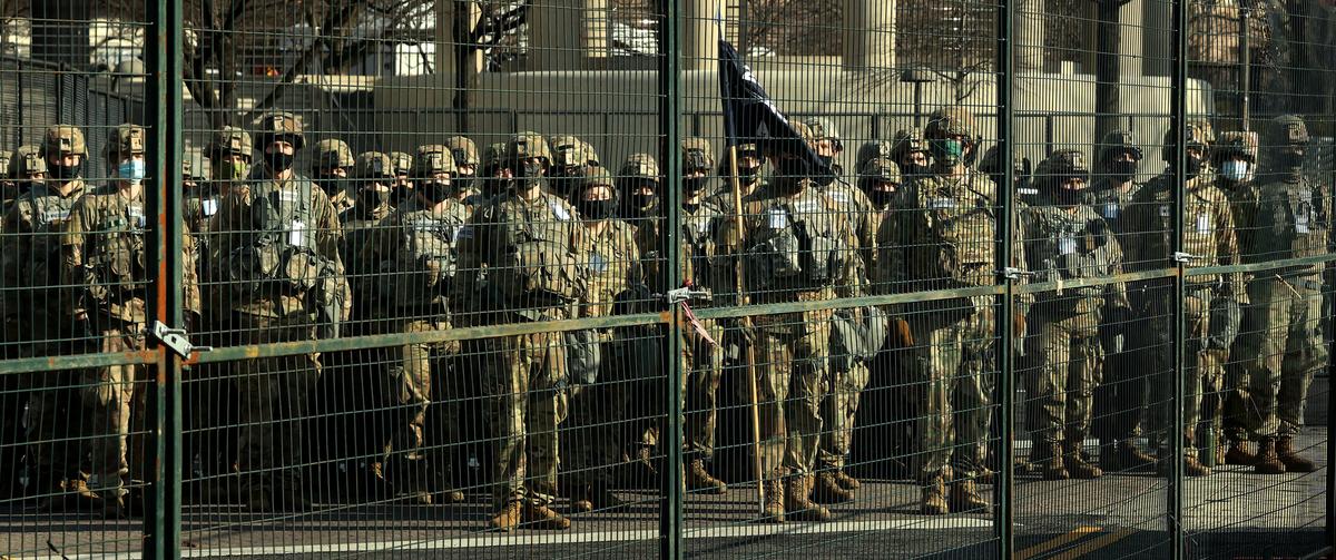 Workers in Washington Start Removing Security Barriers After Biden’s Inauguration