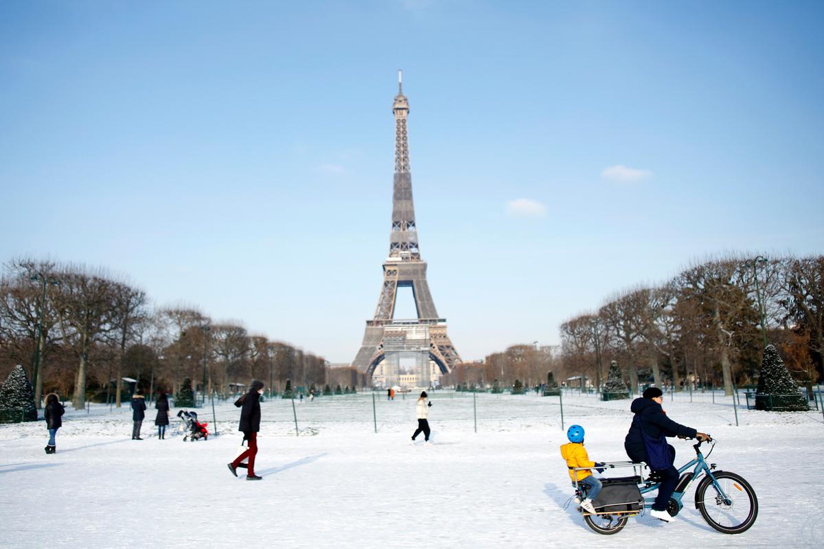 Eiffel Tower Needs Blowtorch for Ice as Snow Blankets Europe