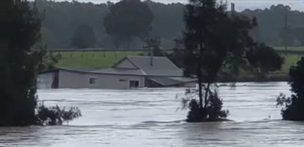 House Swept Down NSW River in Australia