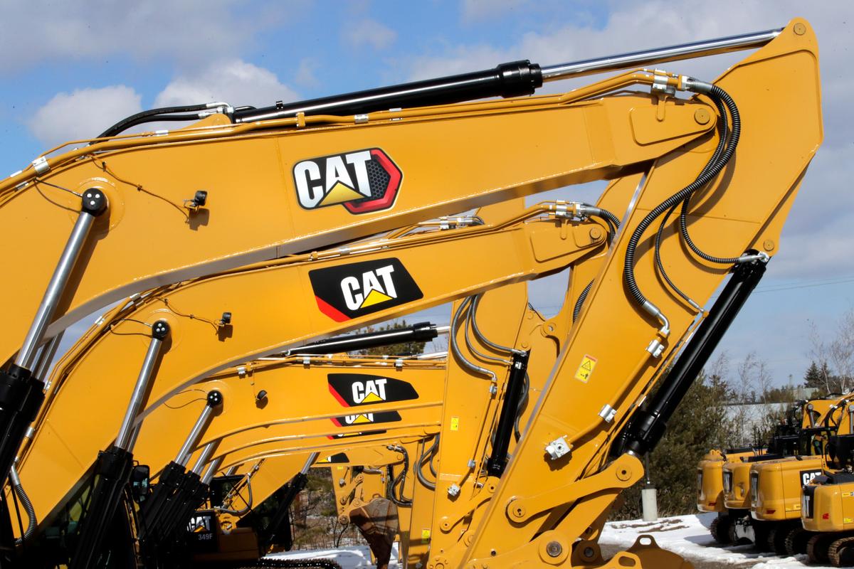 Caterpillar Sales Jump 20 Percent in Fourth Quarter, but Profit per Share Falls