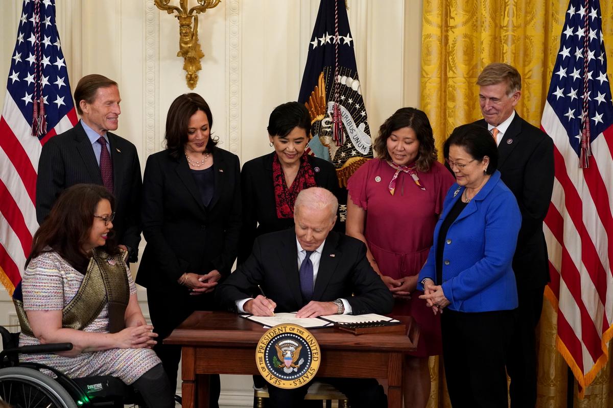 Biden Signs COVID-19 Hate Crimes Bill Into Law