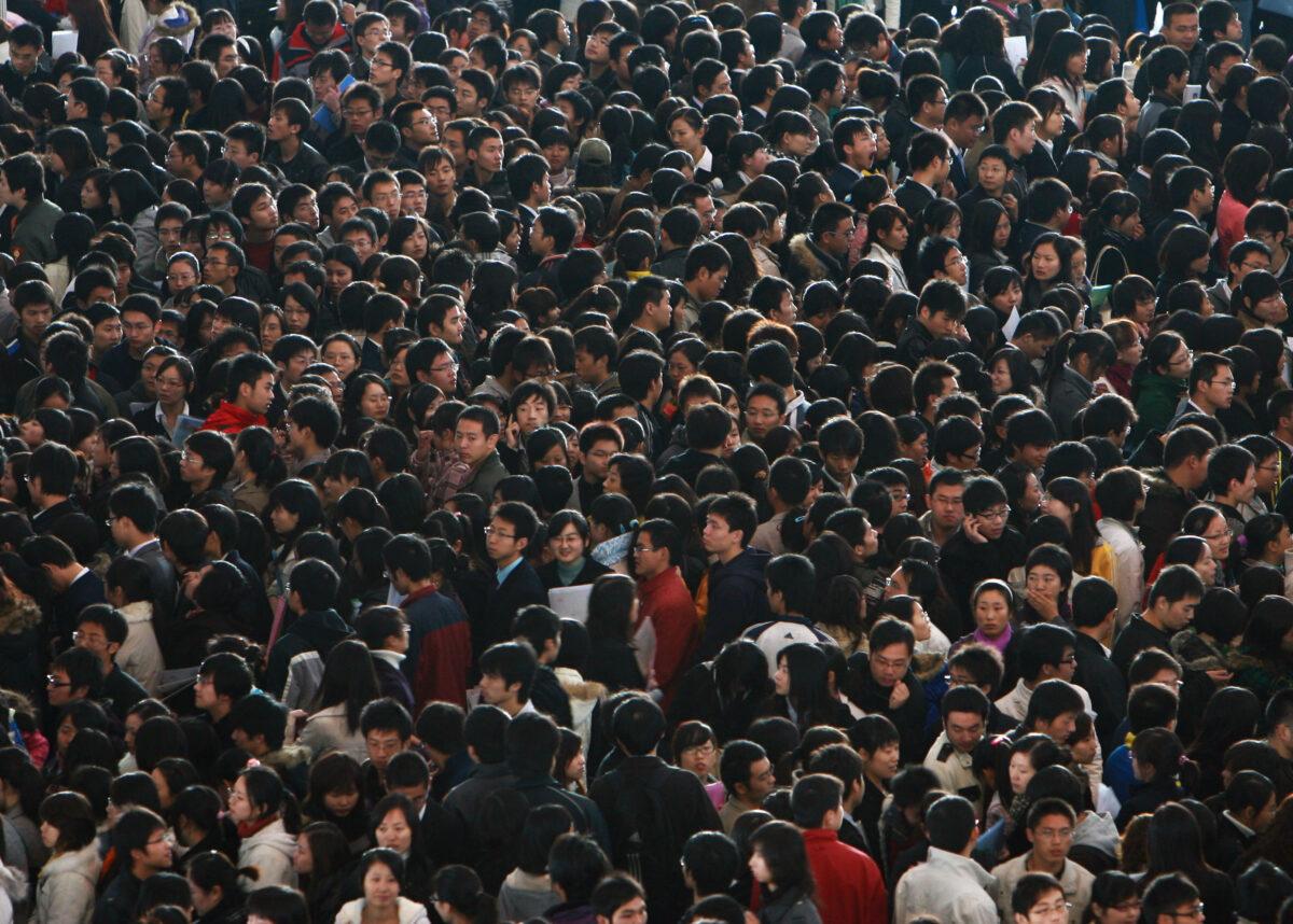 Graduating university students crowd a job fair in Nanjing, Jiangsu Province, China, on Nov. 20, 2008. (China Photos/Getty Images)