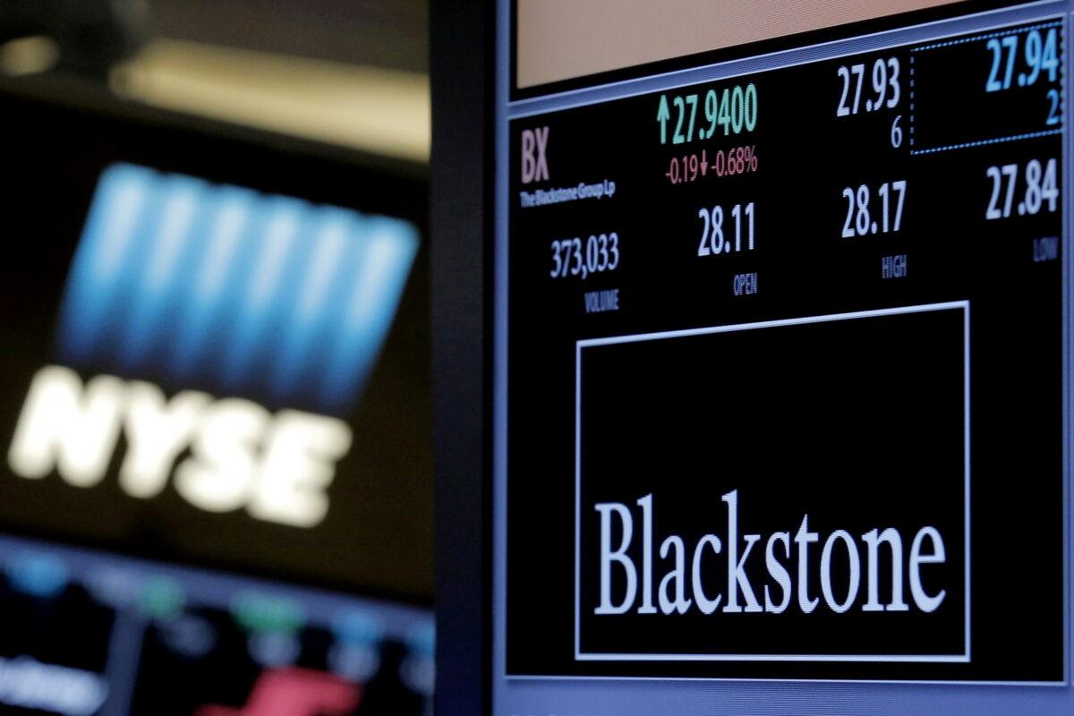 The ticker and trading information for Blackstone Group is displayed on the floor of the New York Stock Exchange on April 4, 2016. (Brendan McDermid/Reuters)