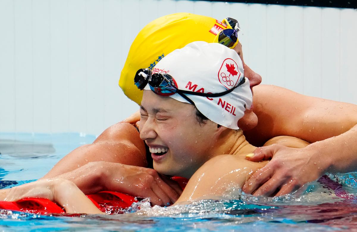 All a Blur as Canada’s MacNeil Claims 2 Medals at Olympics