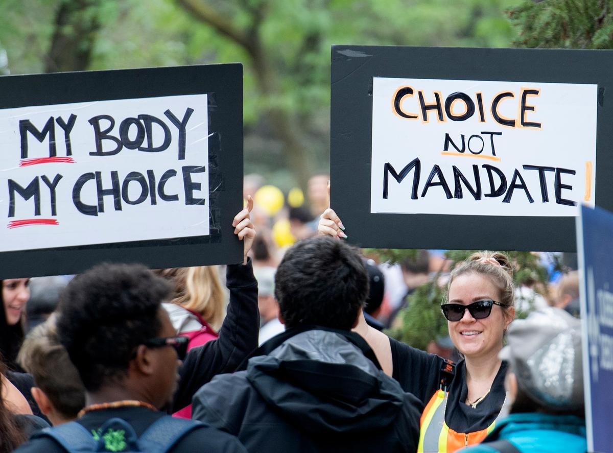 Protesters March in Toronto and Montreal Against Vaccine Mandates, Passports
