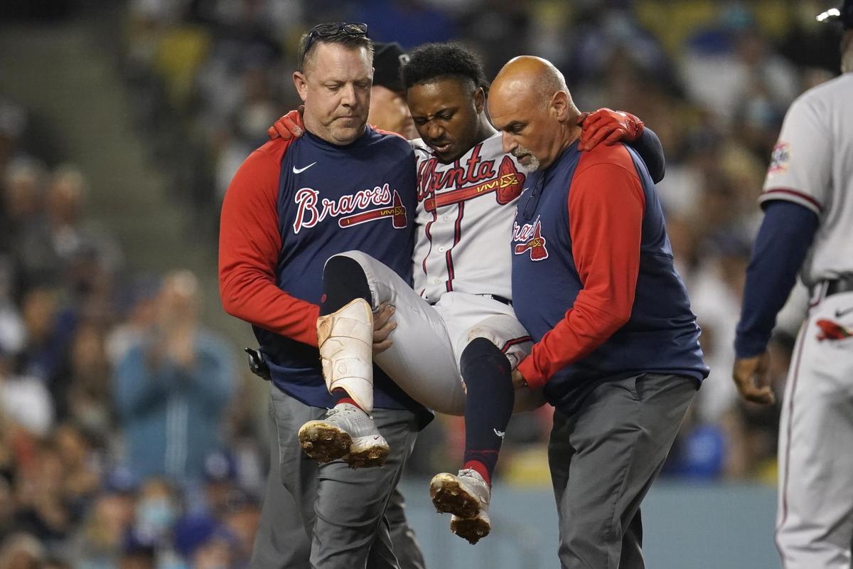 Braves’ All-Star Baseman Carried Off Field After Fouling Ball Off Knee
