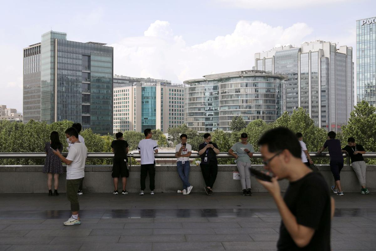 Not My Pay! Some Tech Workers Bemoan China’s Crackdown on Compulsory Overtime