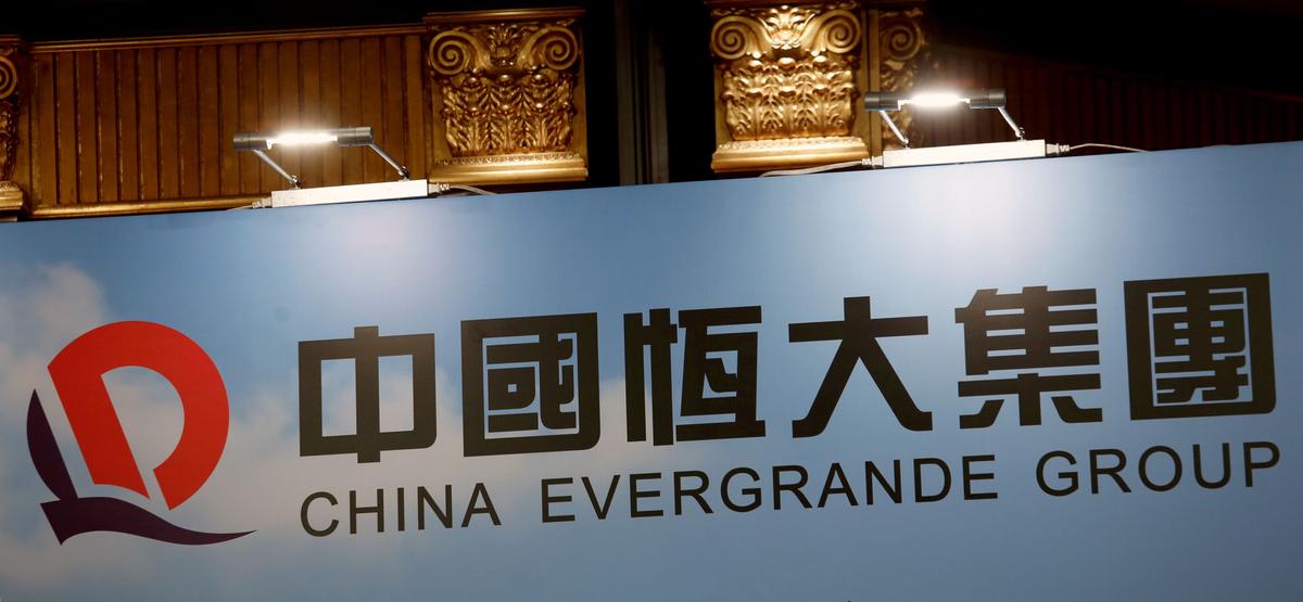 China Evergrande Bonds Suspended as Prices Slump